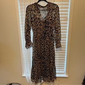 Banana republic modi’s dress with slip, and cuffed detail sleeves.